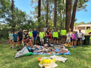 Picture of clean up group and the rubbish collected.